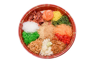 High angle view of food in bowl against white background