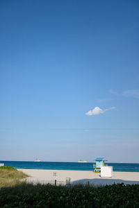 Scenic view of sea against blue sky