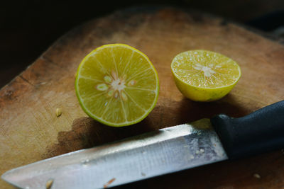 High angle view of lemon slice on cutting board