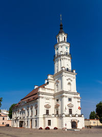 Low angle view of building against blue sky