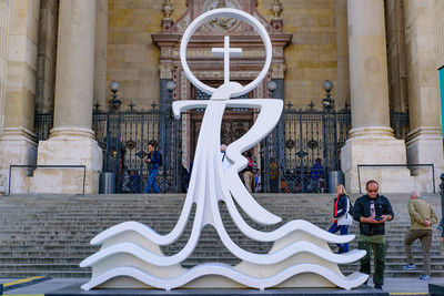 People in front of building