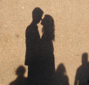 Shadow of couple on a city