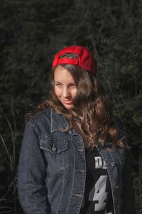 Close-up of young woman standing outdoors