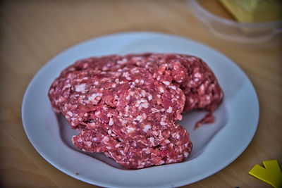 High angle view of meat in plate on table