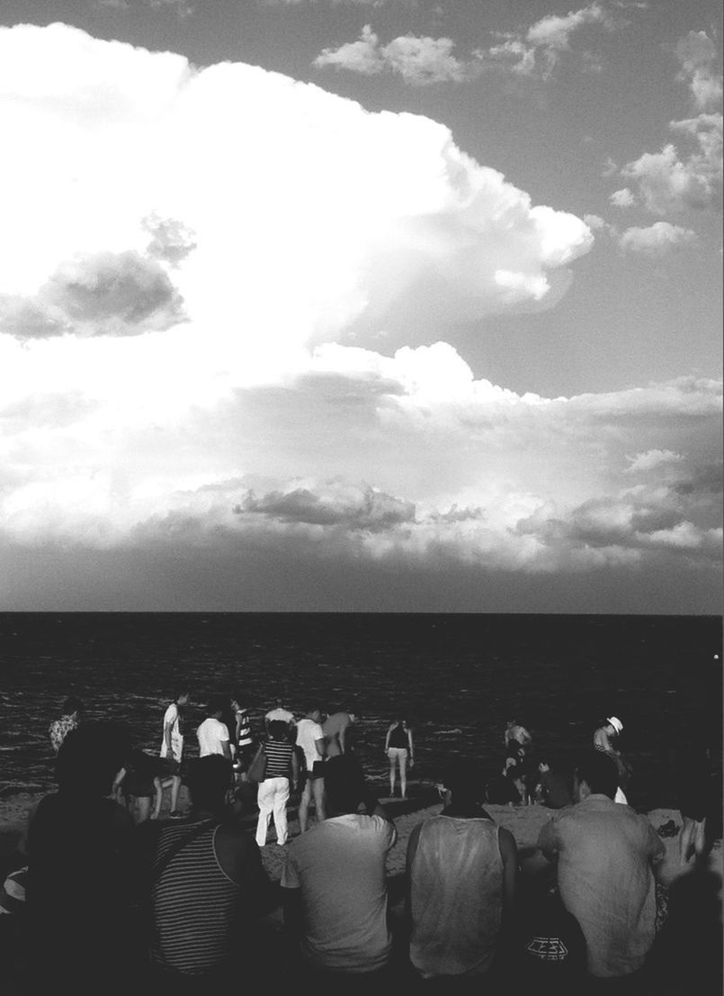 sea, sky, lifestyles, water, leisure activity, large group of people, men, person, cloud - sky, horizon over water, togetherness, vacations, scenics, beach, nature, relaxation, cloud, sitting, beauty in nature