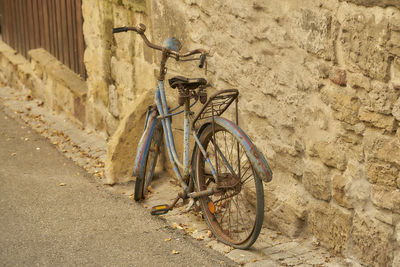 High angle view of bicycle parked on wall