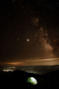 Scenic view of star field against sky at night