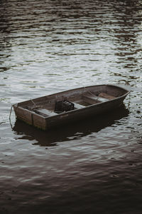 High angle view of boat floating on lake