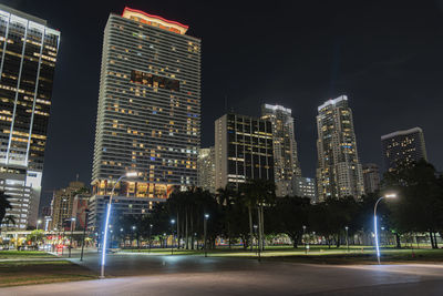 Illuminated buildings in city at night