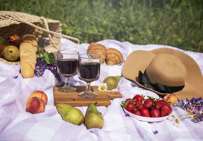 Romantic picnic scene on summer day. 