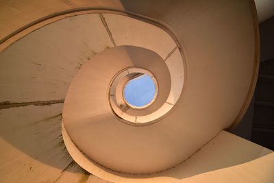 Directly below shot of spiral staircase in building