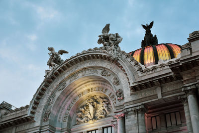 Low angle view of statue against sky