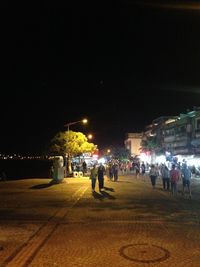 People in city at night