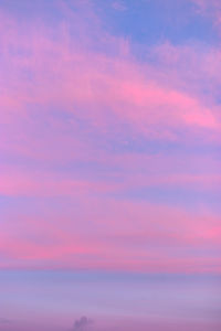 Low angle view of dramatic sky during sunset
