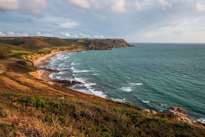 Scenic view in warm tones and colours ecalgrain bay in normandy, france.