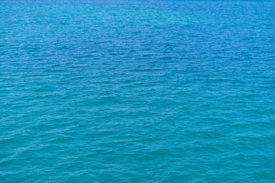 High angle view of swimming pool against blue sea