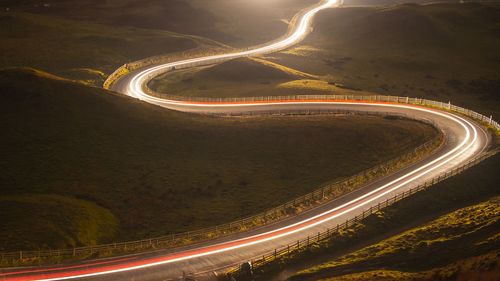 High angle view of light trails on road