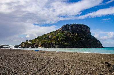 Scenic view of beach against sky