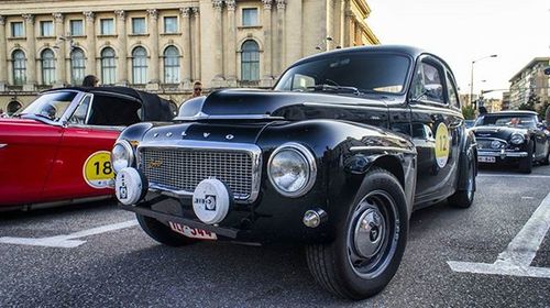 Vintage car parked on road