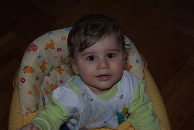 Close-up of cute baby boy at home