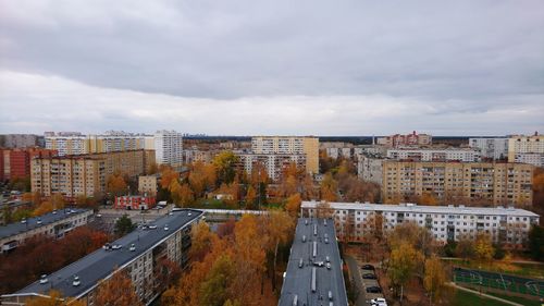 High angle view of road amidst buildings in city