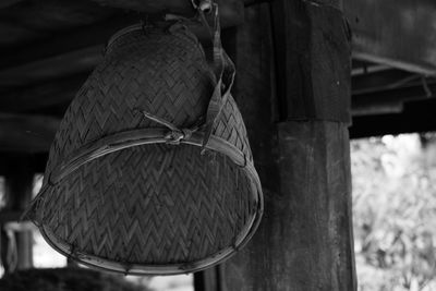 Close-up of rope tied to wooden post