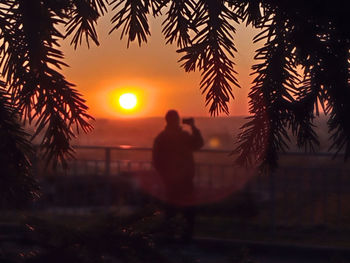Silhouette people at sunset