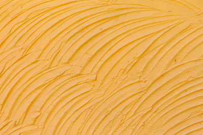 Full frame shot of yellow pattern on wooden floor