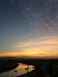 Scenic view of silhouette landscape against sky during sunset