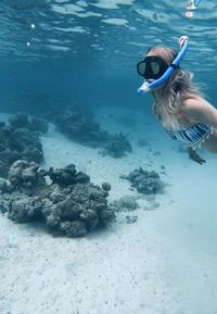 Woman swimming in sea