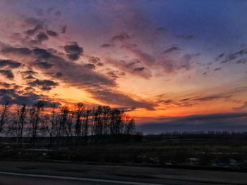 Scenic view of dramatic sky during sunset