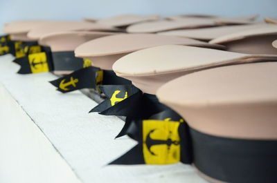 Close-up of navy hats on table