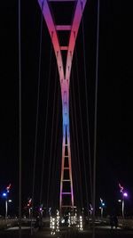 View of suspension bridge at night