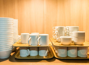 Close-up of coffee cups on table