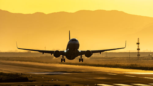 Airplane during sunset