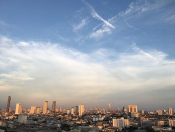 Modern buildings in city against sky