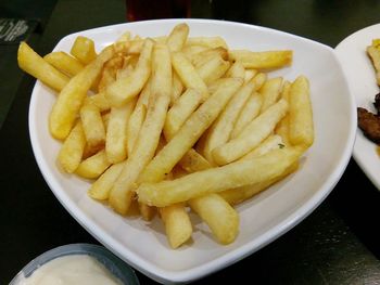 Close-up of served fried fries on plate