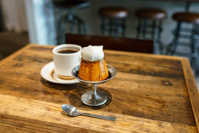 Close-up of coffee cup on table