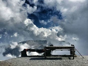 Scenic view of landscape against cloudy sky