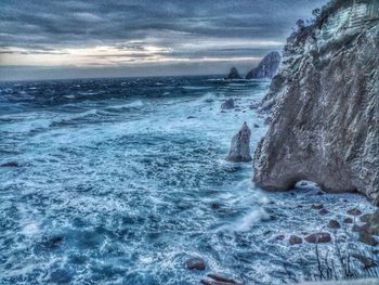 Waves splashing on rocks