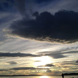 Low angle view of cloudy sky during sunset