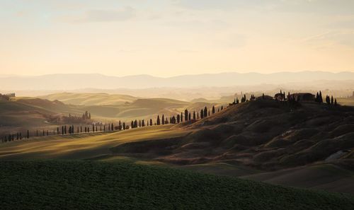 Panoramic view of landscape against sky during sunset