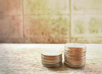 Close-up of coins on table
