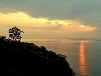 Scenic view of sea at sunset