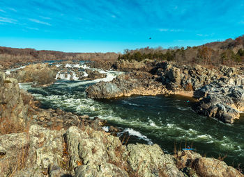 Scenic view of rock formations against sky