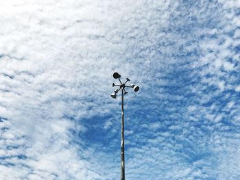 Low angle view of street light against sky