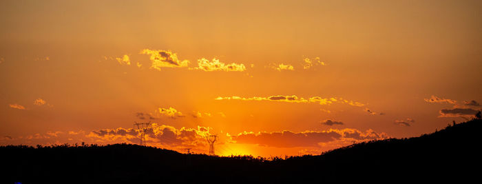 Scenic view of orange sky
