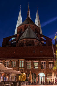 Low angle view of cathedral against blue sky