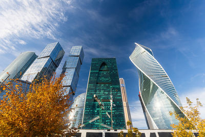 Low angle view of modern buildings against sky