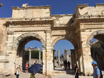 Group of people in front of historical building